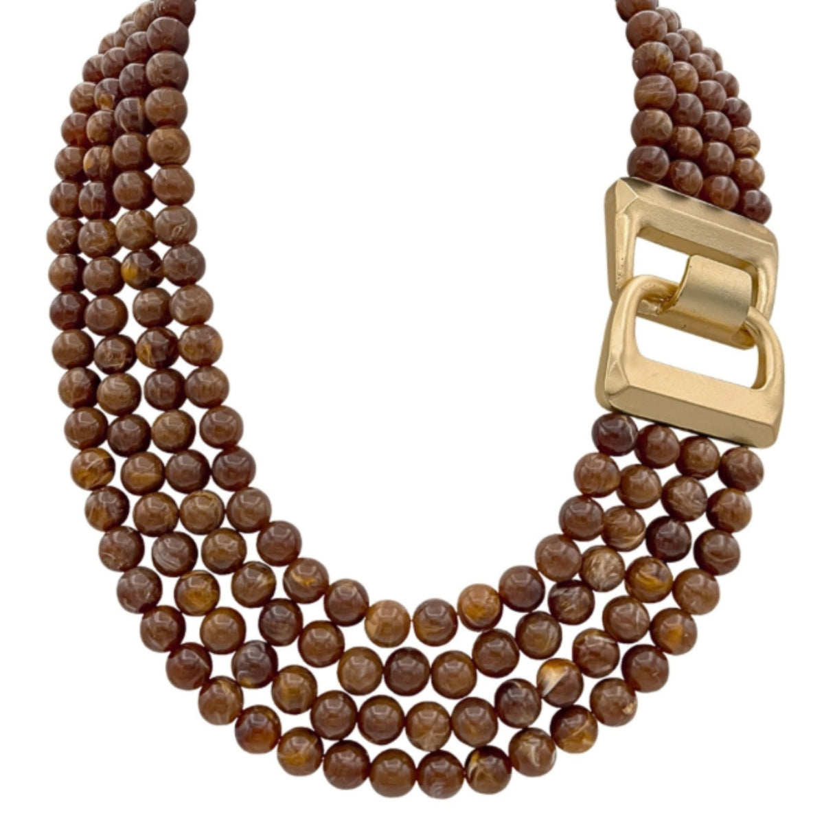 A four-strand navy marbled bead necklace with a matte gold buckle-style clasp, close-up detail view.