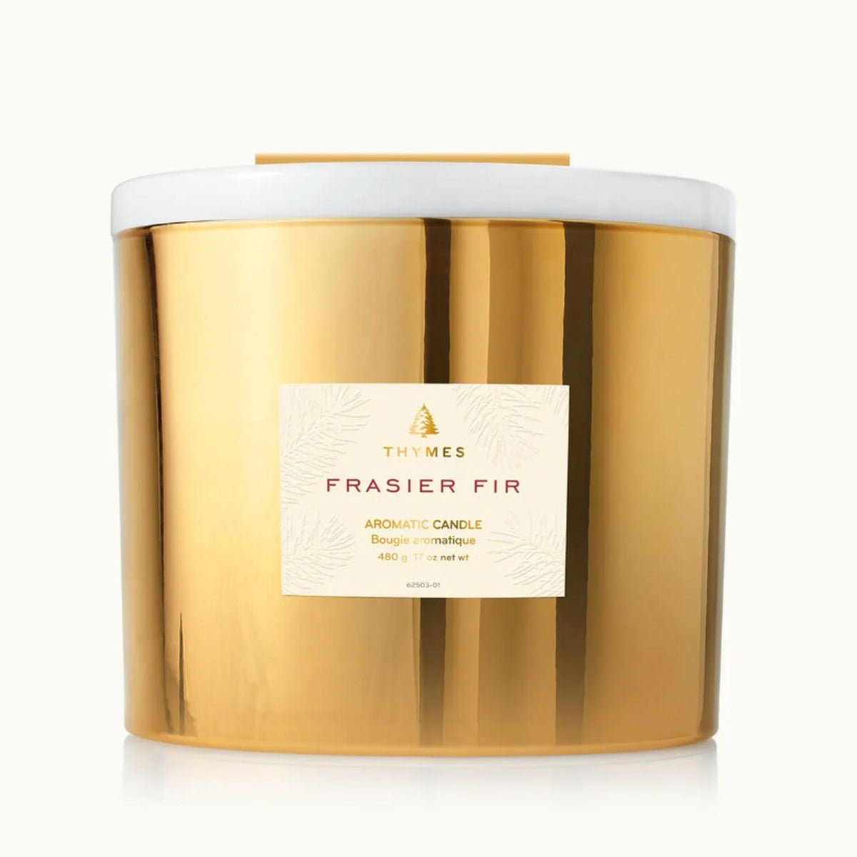 A gold mirrored 3-wick Frasier Fir candle with a white lid and cream label