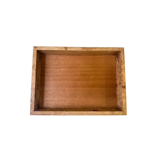 A rectangular wood tray with a mahogany-tone interior and a natural burl-wood border, shown from above.