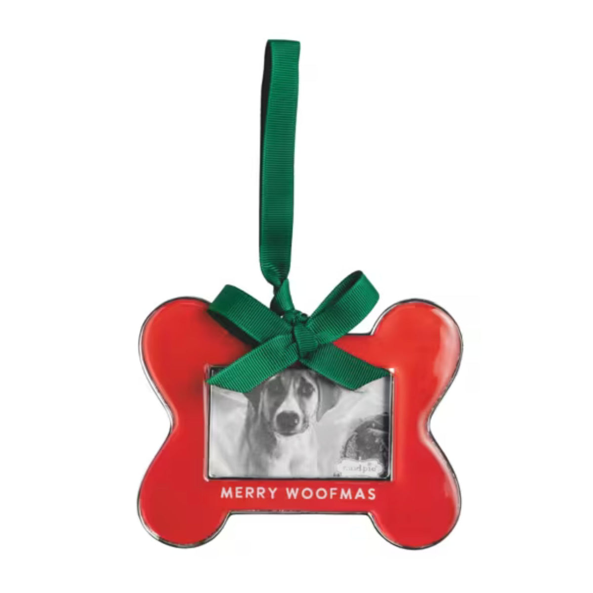 A red bone-shaped Christmas ornament reading 'Merry Woofmas' with a green ribbon, holding a black and white photo of a dog.