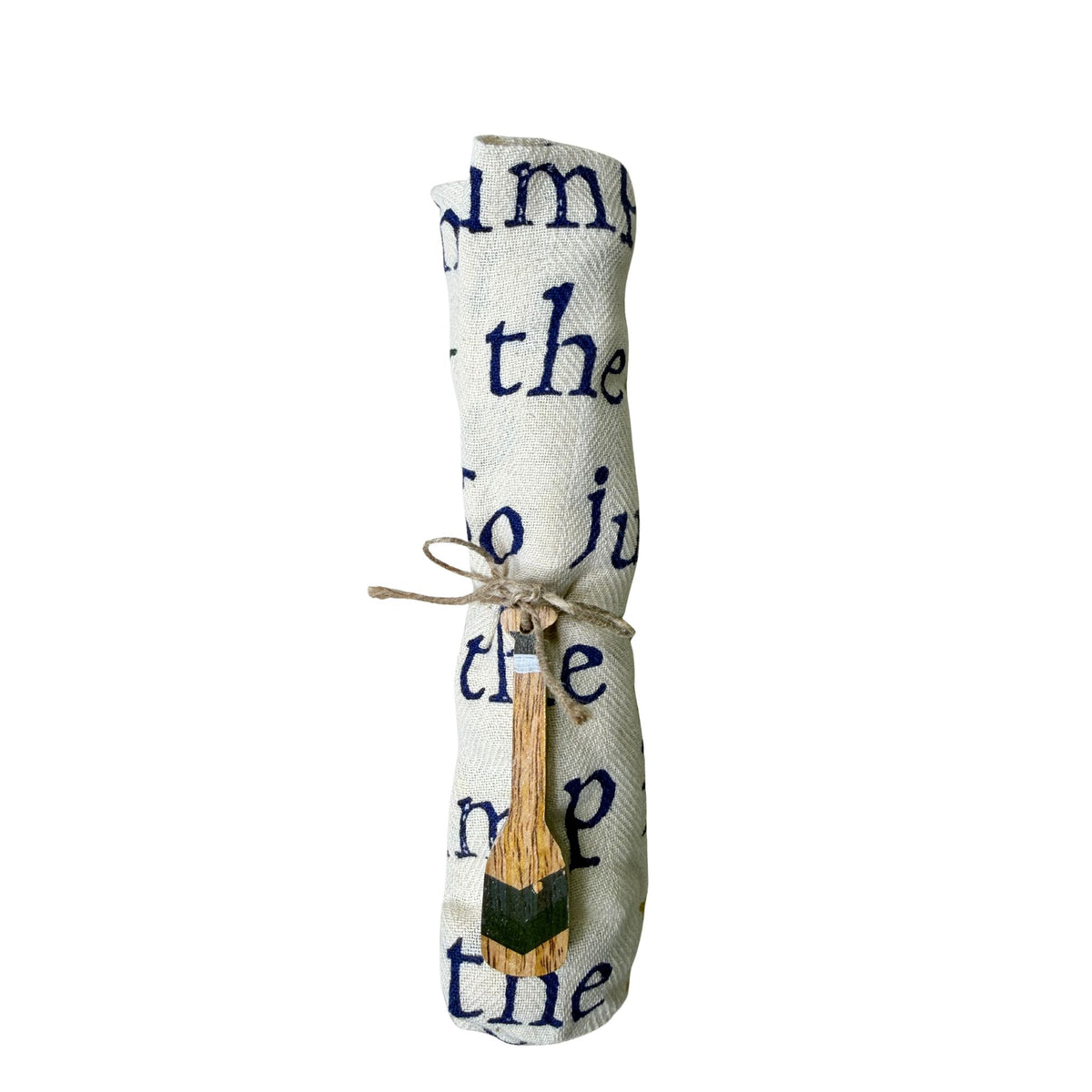 A rolled cream linen tea towel printed with lake sayings, tied with jute twine and a hand-painted wooden oar charm.