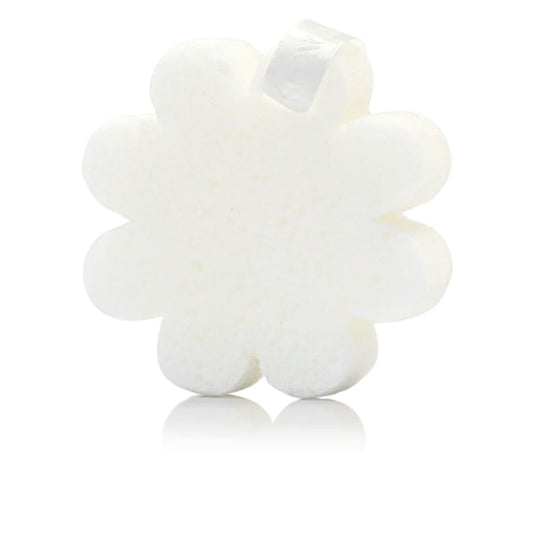 A white daisy-shaped body buffer sponge