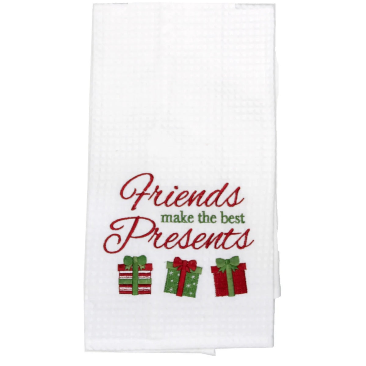 A white waffle-weave kitchen towel embroidered with 'Friends make the best Presents' in red and green script above three wrapped gift boxes.