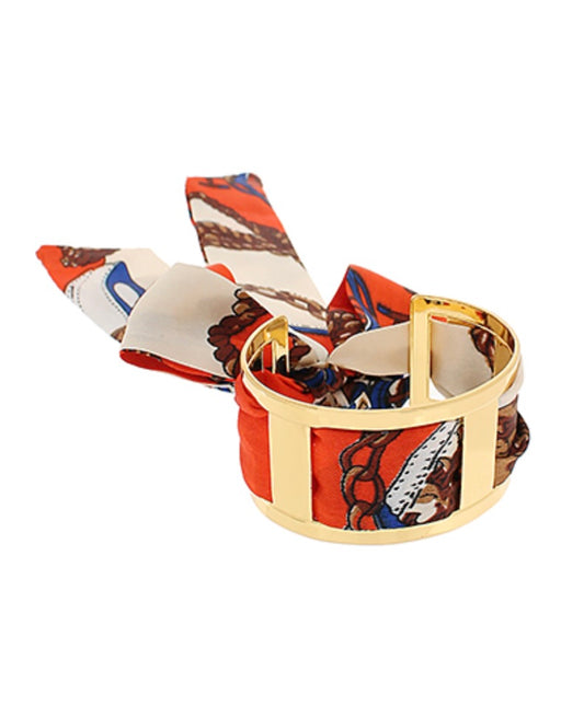 Gold bangle scarf bracelet with cheetah-print fabric wrap, front view