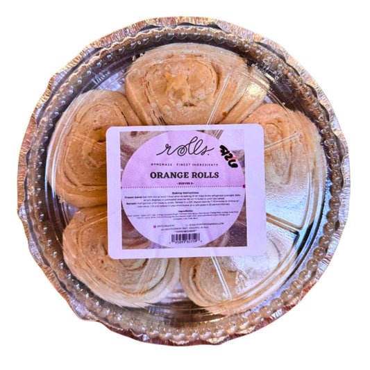 Orange rolls in a clear plastic container with a silver foil rim