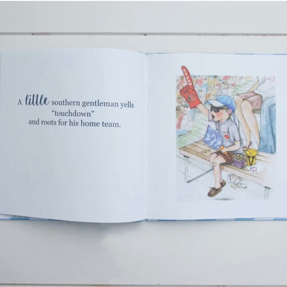 An open children's book lying flat on a white wood surface, showing printed text on the left page and a colorful illustration on the right page.