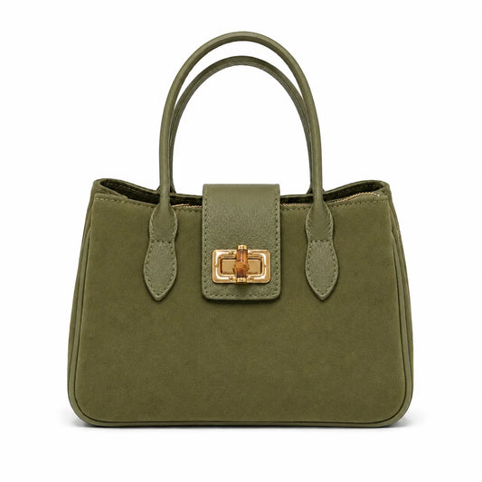 Olive green suede satchel with smooth leather trim, double top handles, and a gold-tone turn-lock closure on the front flap.