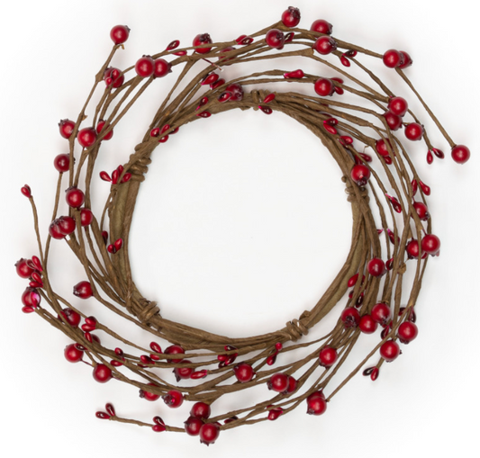 Red berry wreath on twig branches shown on a white background