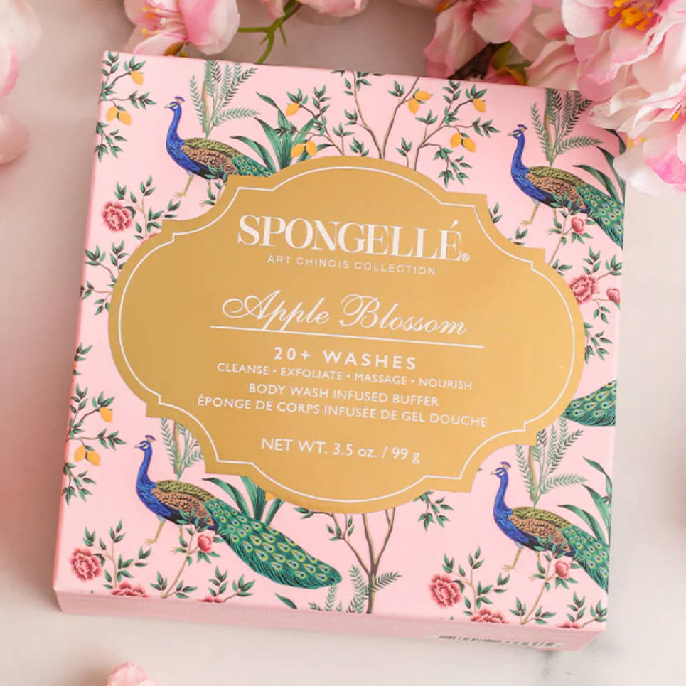 Spongellé Apple Blossom soap packaging with peacock design on a floral background