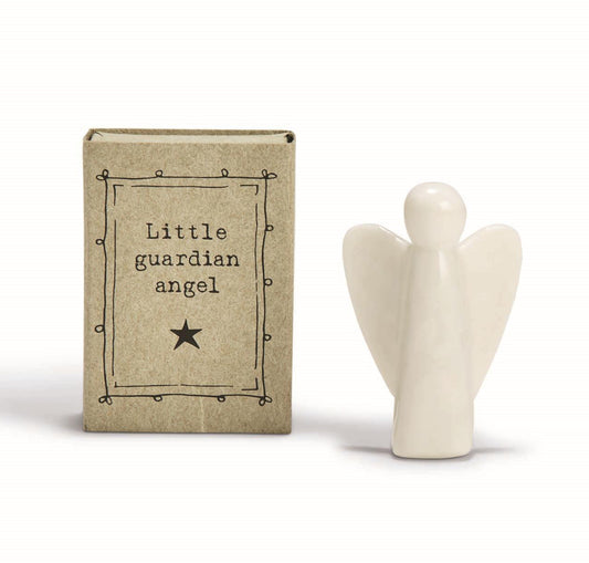 Tiny porcelain guardian angel figurine tucked inside a matchbox printed "Little Guardian Angel"