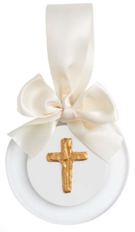 White ceramic round ornament with a cream ribbon bow and a gold cross charm