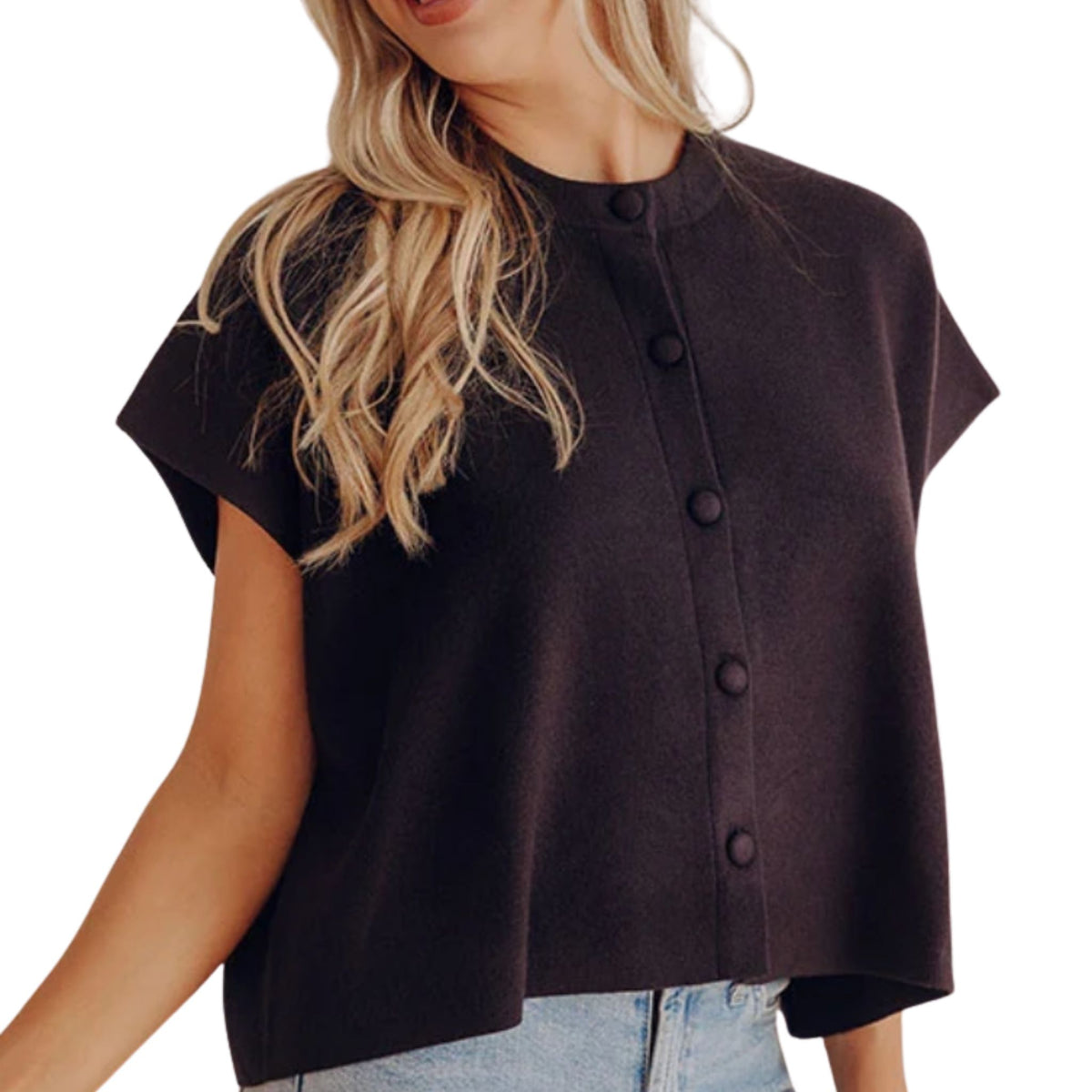 Woman wearing a black button-down cap-sleeve sweater